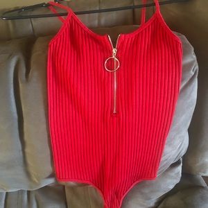 Red zip up onesie